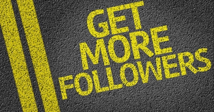 Text 'GET MORE FOLLOWERS' written in bold yellow letters on a textured black background with two yellow lines running vertically on the left side.